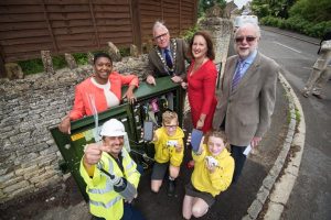 Picture: Andrew Walmsley 15/07/16 Steeple Aston L-R standing: Stacey King (BT regional manager), Cllr Michael Waine (chair of OCC), Victoria Prentis MP, and Cllr Ken Atack L-R front: Karl Rolfe (Openreach engineer), Oscar Willis and Emily Whiting (kids from Dr Radcliffe's Church of England primary school) Steeple Aston residents, businesses, children and community groups were today (Friday) joined by Victoria Prentis MP to celebrate even more of the village getting better access to the information superhighway. The historic village is the first community in Cherwell district to benefit from the second phase of the multi-million pound Better Broadband for Oxfordshire programme. The roll-out, which is part of the Government’s Broadband Delivery UK (BDUK) programme, is led by Oxfordshire County Council and BT, supported by Cherwell District Council, South East Midlands Local Enterprise Partnership (SEM LEP) and OxLEP (Oxfordshire Local Enterprise Partnership).