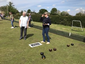 Two members with bowls